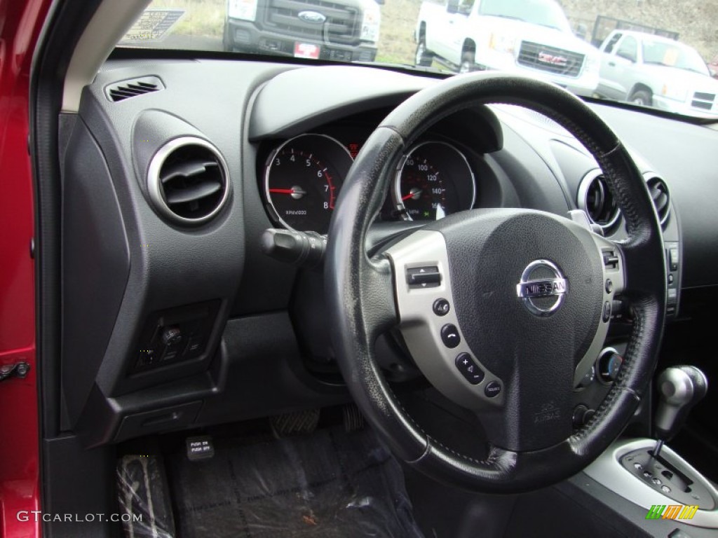 2009 Rogue SL AWD - Venom Red / Black photo #11