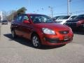 Tropical Red - Rio LX Sedan Photo No. 8