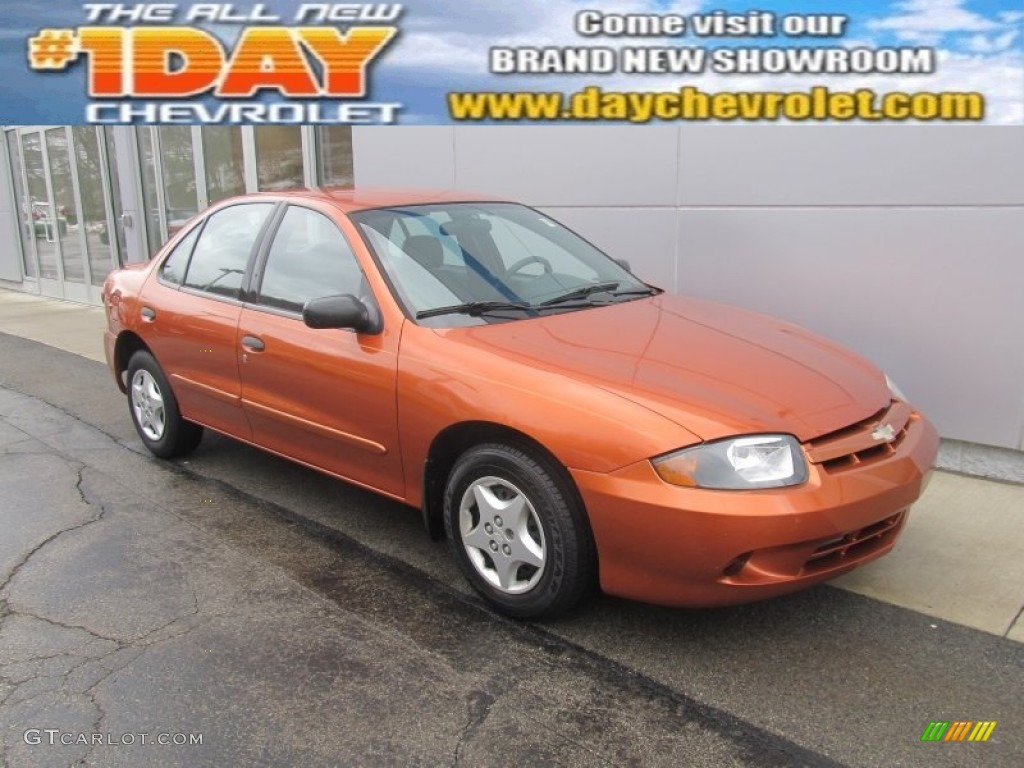 2004 Cavalier Sedan - Sunburst Orange / Graphite photo #1