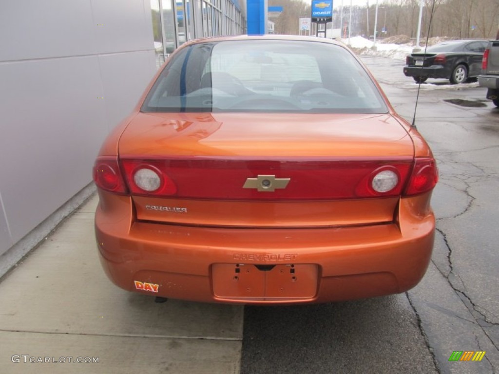 2004 Cavalier Sedan - Sunburst Orange / Graphite photo #5