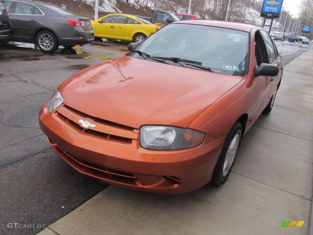 2004 Cavalier Sedan - Sunburst Orange / Graphite photo #7