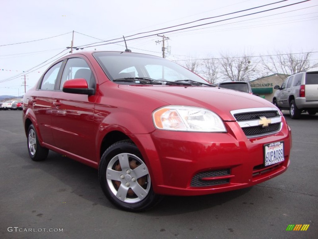 2010 Aveo LT Sedan - Sport Red / Charcoal photo #1