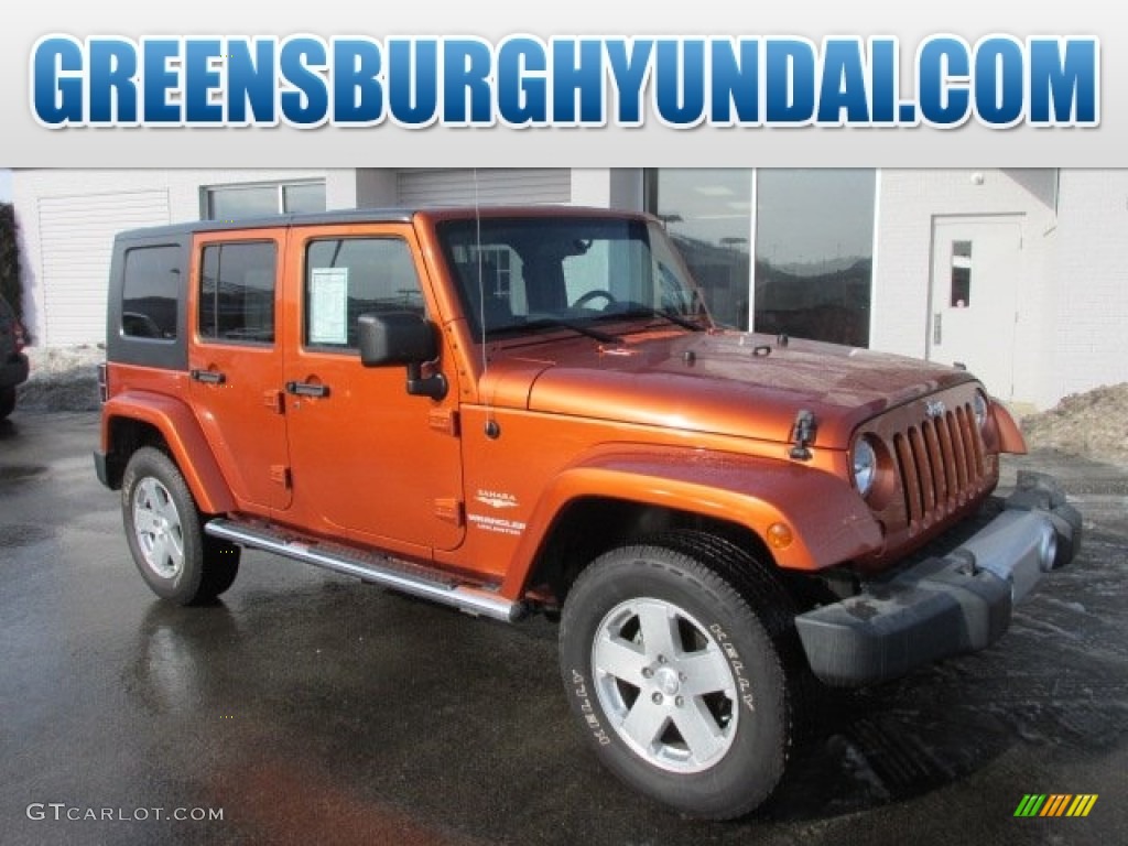 2010 Wrangler Unlimited Sahara 4x4 - Mango Tango Pearl / Dark Slate Gray/Medium Slate Gray photo #1
