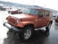 2010 Mango Tango Pearl Jeep Wrangler Unlimited Sahara 4x4  photo #5