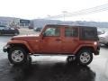 2010 Mango Tango Pearl Jeep Wrangler Unlimited Sahara 4x4  photo #6