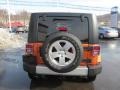 2010 Mango Tango Pearl Jeep Wrangler Unlimited Sahara 4x4  photo #8