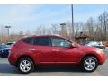 2010 Venom Red Nissan Rogue SL  photo #2