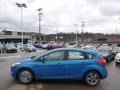 2014 Blue Candy Ford Focus SE Hatchback  photo #5