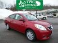 Red Brick 2012 Nissan Versa 1.6 SL Sedan