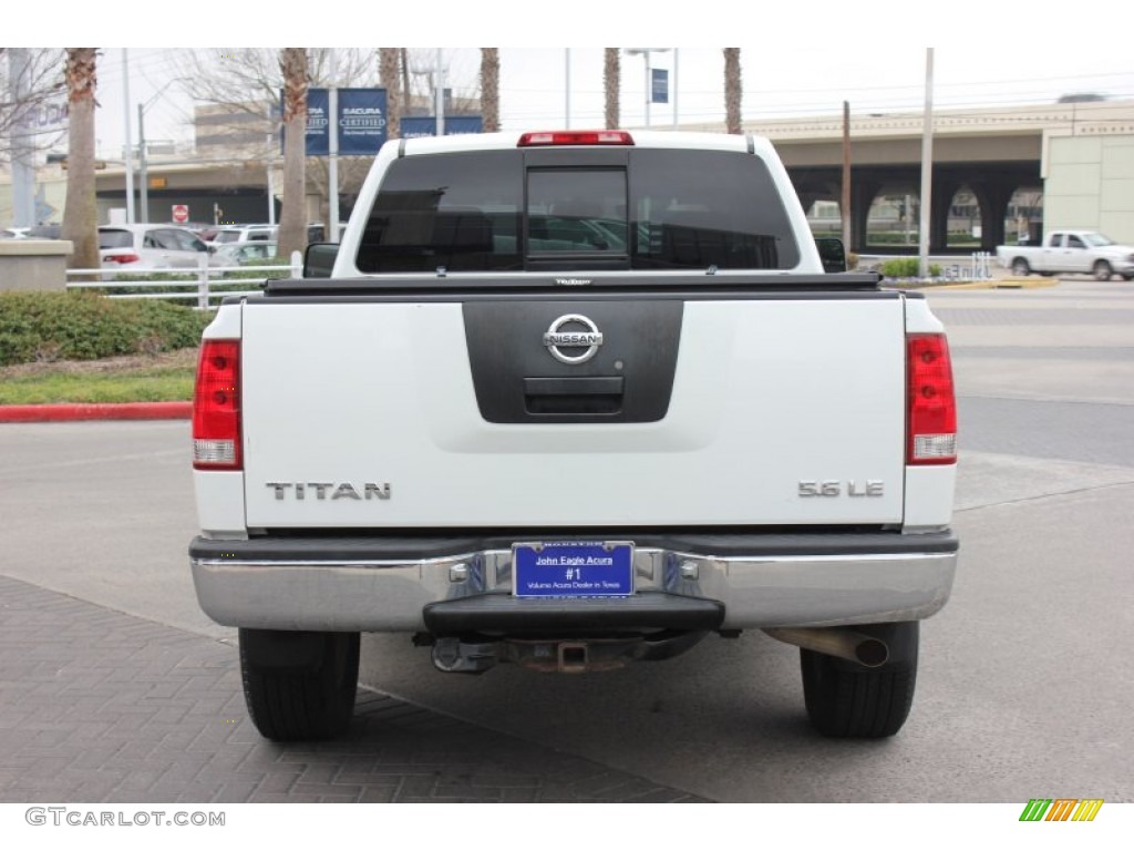 2004 Titan LE King Cab 4x4 - White / Graphite/Titanium photo #4