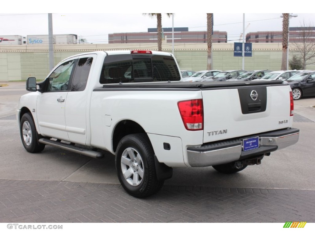 2004 Titan LE King Cab 4x4 - White / Graphite/Titanium photo #7