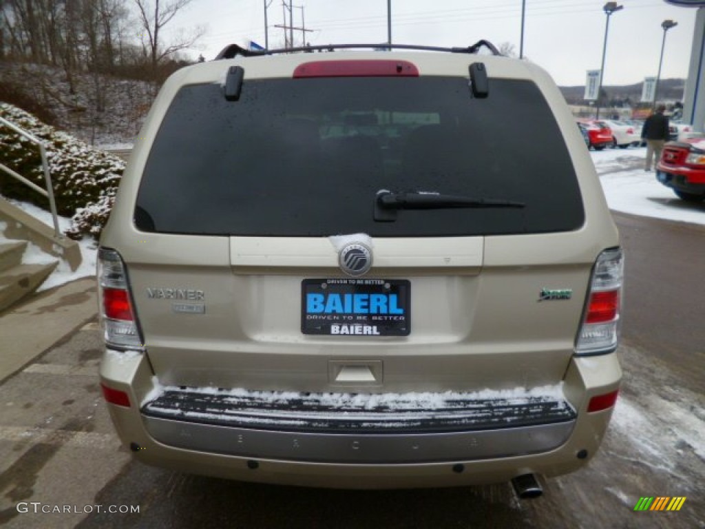 2010 Mariner V6 Premier 4WD - Gold Leaf Metallic / Black photo #6