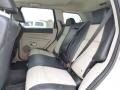 2010 Jeep Grand Cherokee Dark Slate Gray/Light Graystone Interior Rear Seat Photo