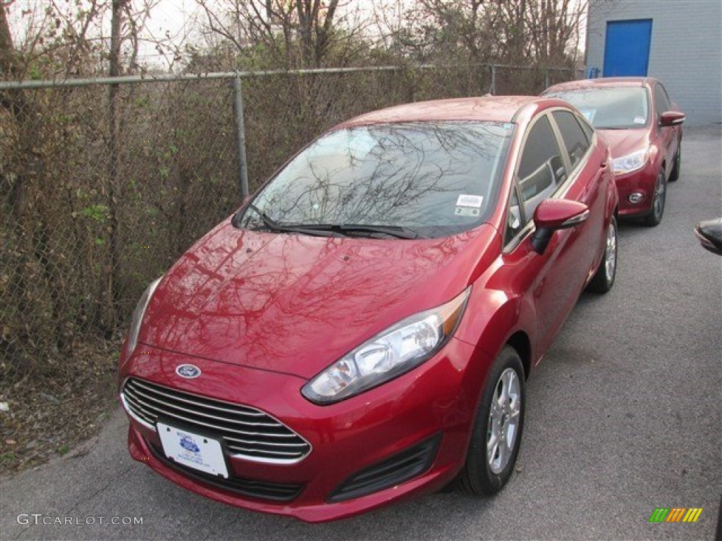 2014 Fiesta SE Sedan - Ruby Red / Charcoal Black photo #1