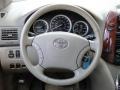 2004 Toyota Sienna Fawn Beige Interior Steering Wheel Photo