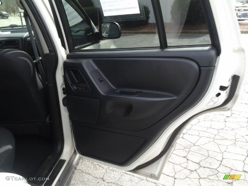 2002 Jeep Grand Cherokee Laredo 4x4 Sandstone Door Panel Photo #91238102
