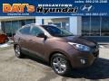 Kona Bronze - Tucson SE AWD Photo No. 1