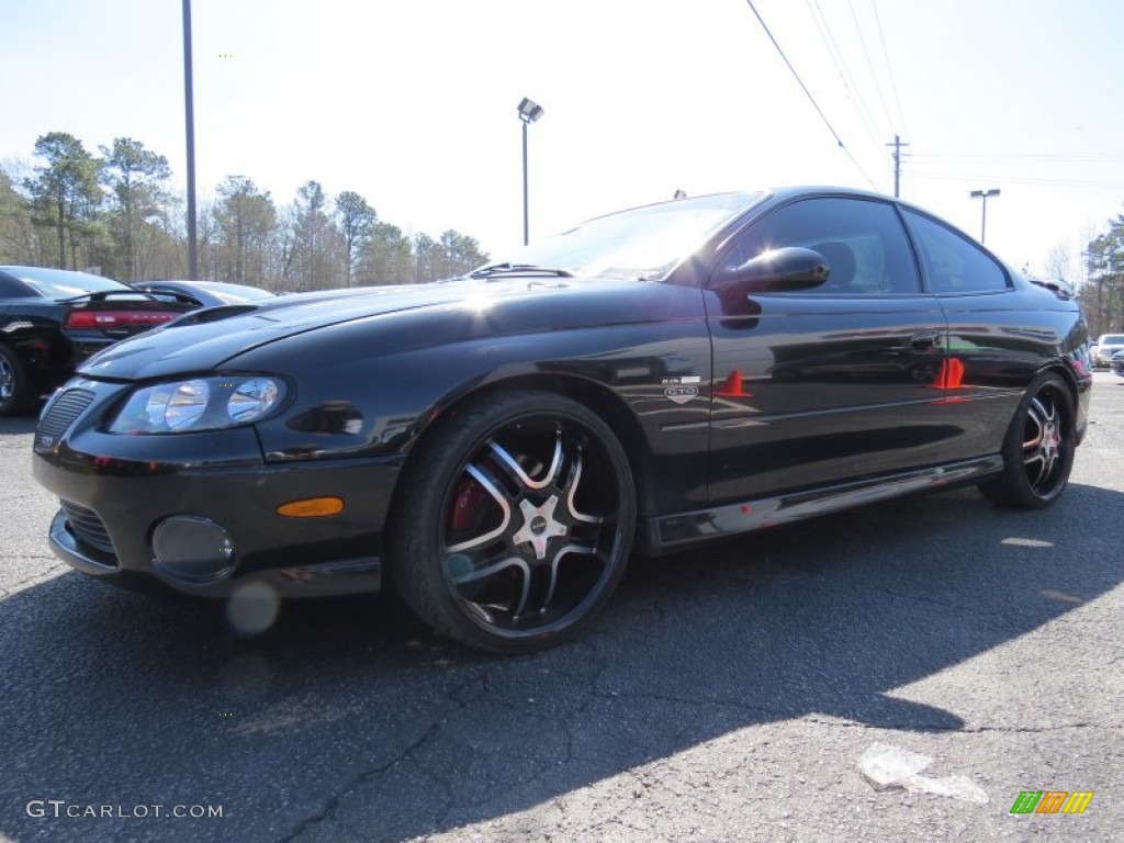2006 GTO Coupe - Phantom Black Metallic / Red photo #3