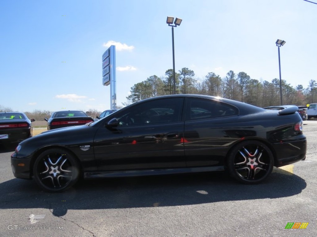 2006 GTO Coupe - Phantom Black Metallic / Red photo #4
