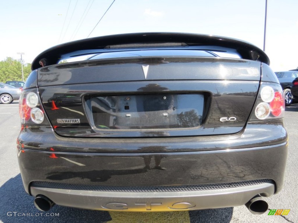 2006 GTO Coupe - Phantom Black Metallic / Red photo #6