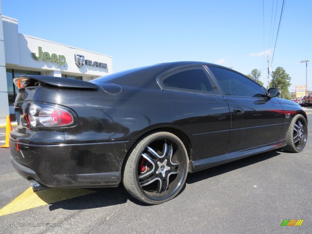 2006 GTO Coupe - Phantom Black Metallic / Red photo #7