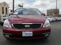 2014 Claret Red Kia Sedona LX  photo #3