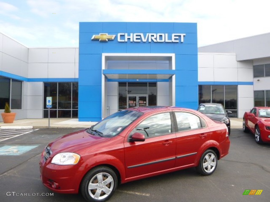 2010 Aveo LT Sedan - Sport Red / Charcoal photo #1