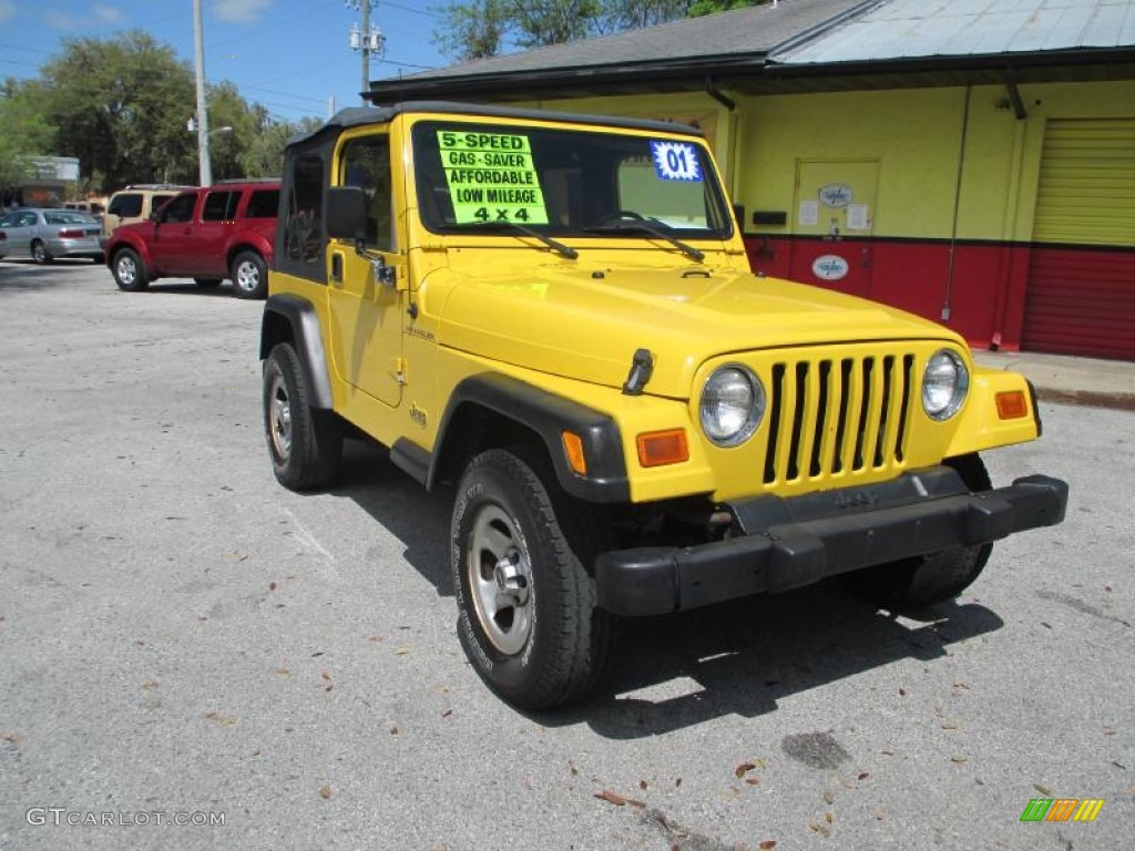 Solar Yellow 2001 Jeep Wrangler SE 4x4 Exterior Photo #91596407