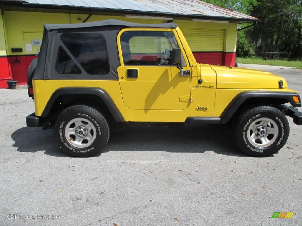 Solar Yellow 2001 Jeep Wrangler SE 4x4 Exterior Photo #91596413