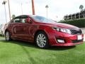 2014 Remington Red Kia Optima EX  photo #1