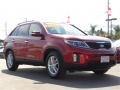 2014 Remington Red Kia Sorento LX  photo #1