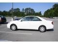 2004 Super White Toyota Camry LE  photo #7