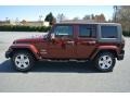 2010 Red Rock Crystal Pearl Jeep Wrangler Unlimited Sahara  photo #3