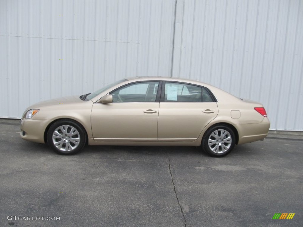 2010 Avalon XLS - Sandy Beach Metallic / Ivory photo #2