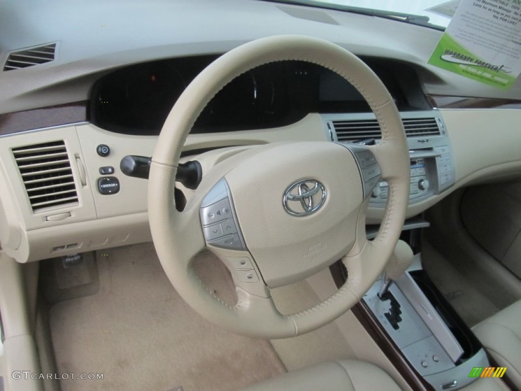 2010 Avalon XLS - Sandy Beach Metallic / Ivory photo #15