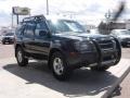 2004 Super Black Nissan Xterra SE 4x4  photo #16