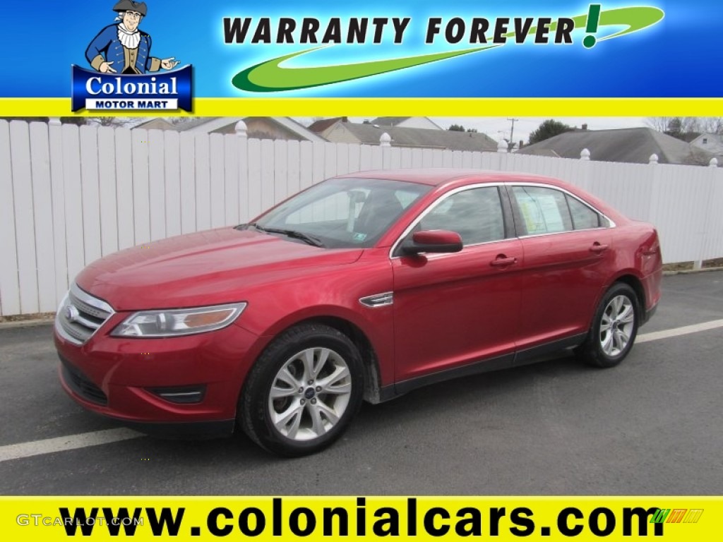 2012 Taurus SEL - Red Candy Metallic / Charcoal Black photo #1