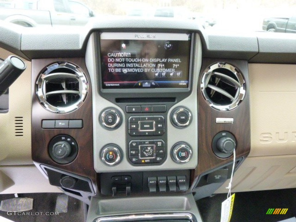 2014 F350 Super Duty Lariat Crew Cab 4x4 - Ruby Red Metallic / Adobe photo #14