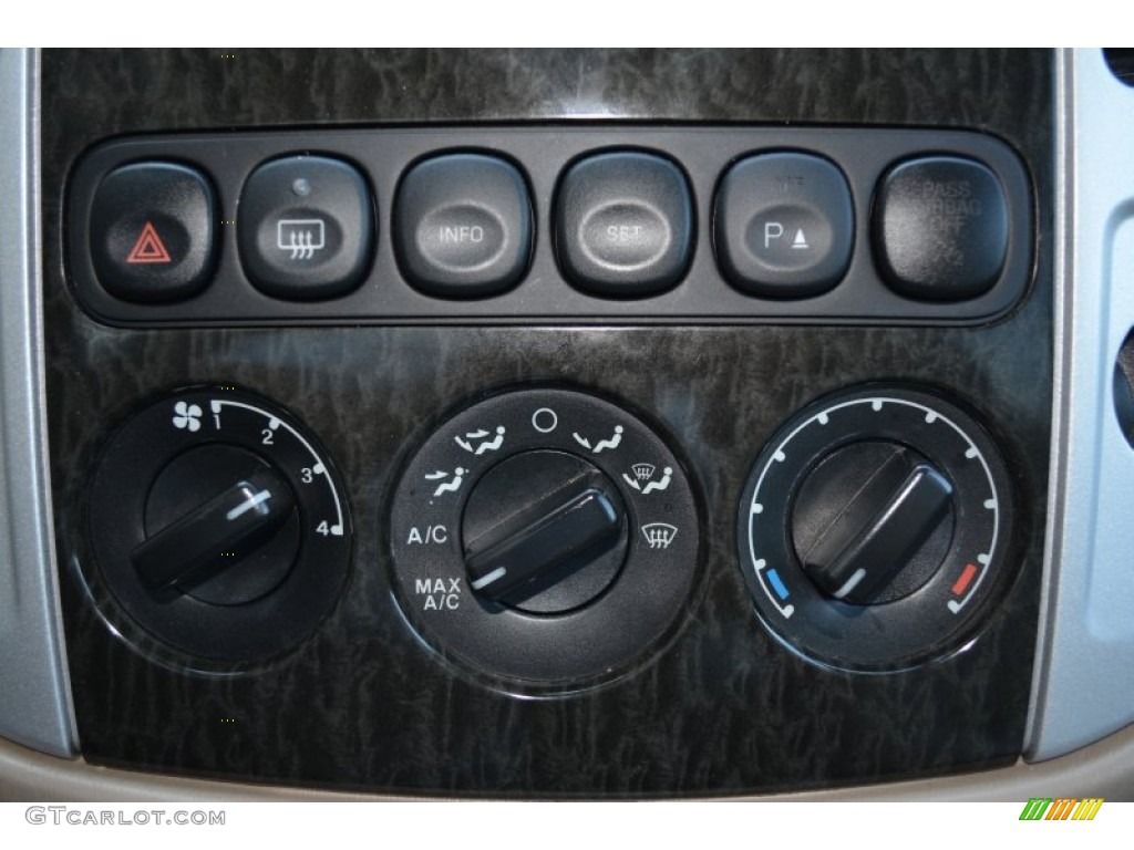 2005 Mariner Premier 4WD - Black / Pebble/Light Parchment photo #24