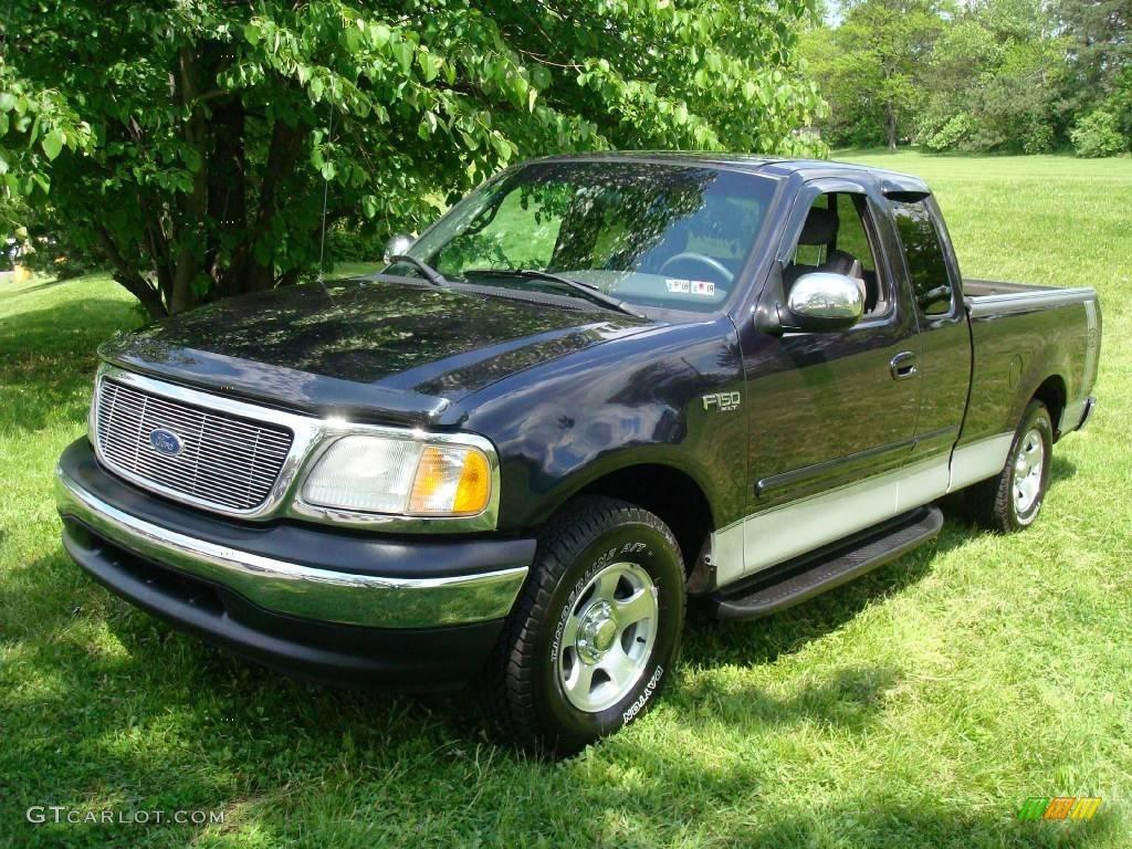 2001 F150 XLT SuperCab - Black / Medium Graphite photo #1