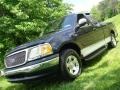 2001 Black Ford F150 XLT SuperCab  photo #2