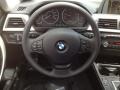 Black 2014 BMW 3 Series 320i Sedan Steering Wheel