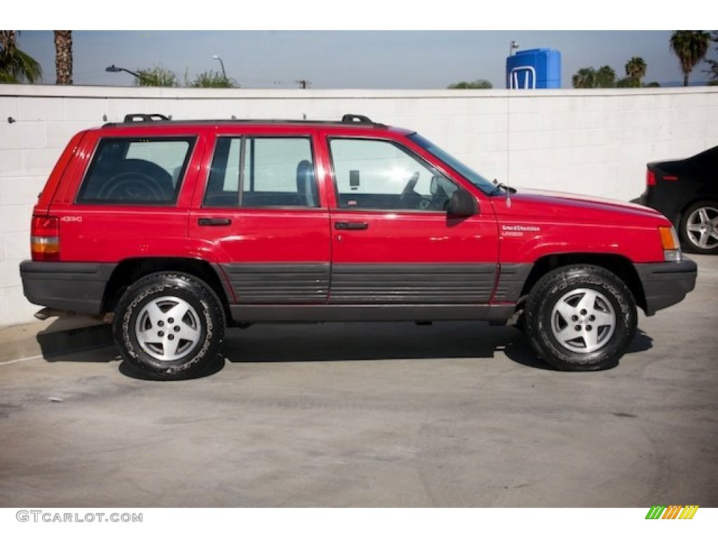 Flame Red 1994 Jeep Grand Cherokee SE 4x4 Exterior Photo #92368351