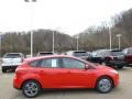 2014 Race Red Ford Focus SE Hatchback  photo #1