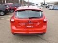 2014 Race Red Ford Focus SE Hatchback  photo #7