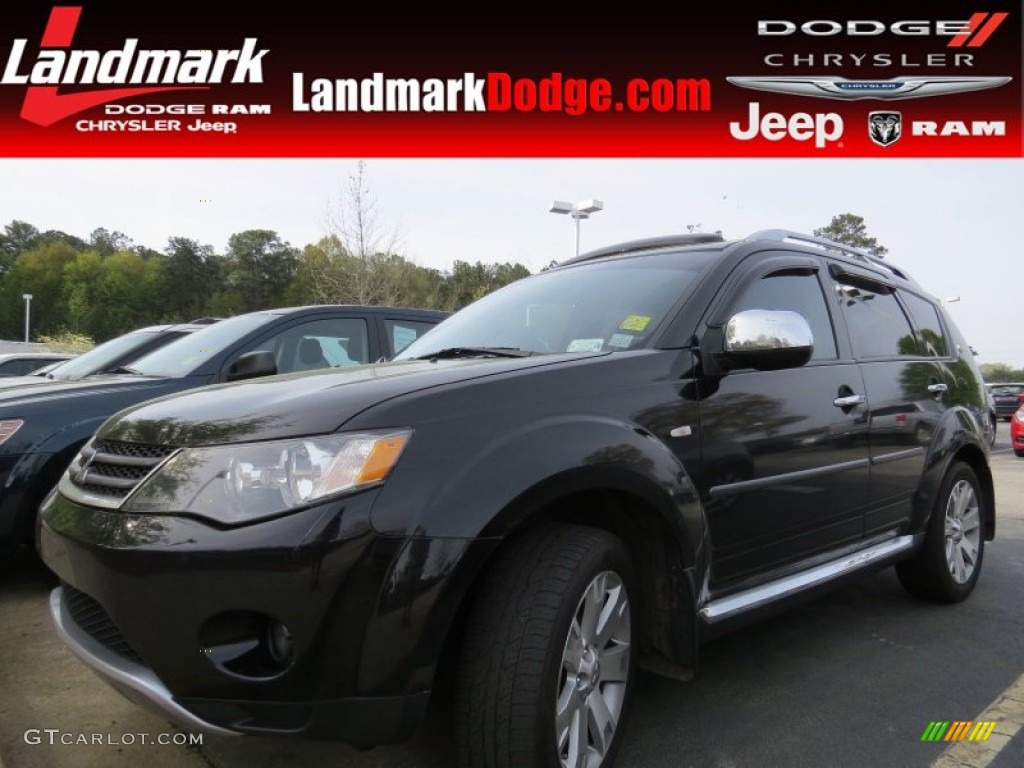 2009 Outlander SE 4WD - Labrador Black Pearl / Black photo #1