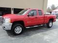 2011 Victory Red Chevrolet Silverado 2500HD LT Extended Cab 4x4  photo #1