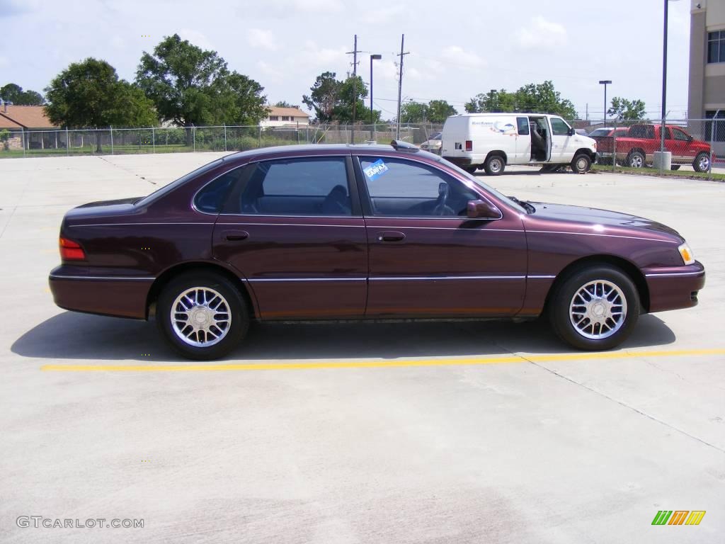 1999 Avalon XL - Napa Burgundy Red Pearl / Ivory photo #2