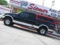 2000 Black Ford F150 XLT Extended Cab 4x4  photo #2