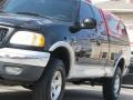 2000 Black Ford F150 XLT Extended Cab 4x4  photo #4